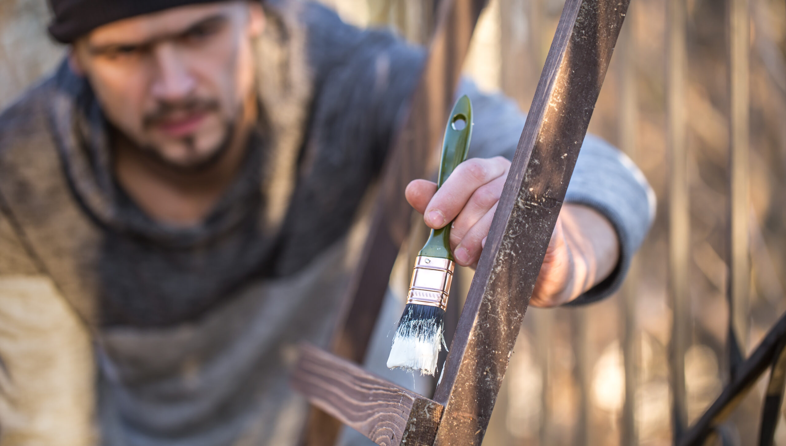 https://www.freepik.com/free-photo/man-paints-with-white-paint-wooden-planks-man-industrial-concept-there-is-place-text-object-is-close-up_10107141.htm#fromView=search&page=1&position=2&uuid=1c2206a9-fdea-4b9f-9347-2d8dae130b31&query=metal+fence+rust+removal